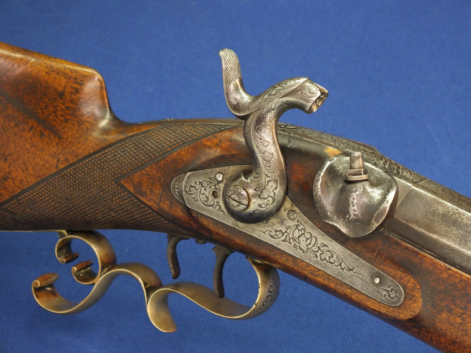 A very heavy German Target percussion Rifle by A. Andriessen Aachen. Caliber 18mm. 104cm/41 inch octagon Barrel. Length 143cm. In very good condition. Price 2.450 euro.