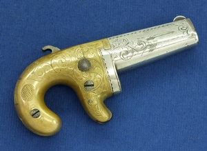 A very scarce antique De Luxe Factory Engraved Gold & Silver Political Gift Moore's Patent Breechloading Deringer with Patriotic Motives, Caliber 41 Rimfire, length 13 cm, in nearly mint condition.