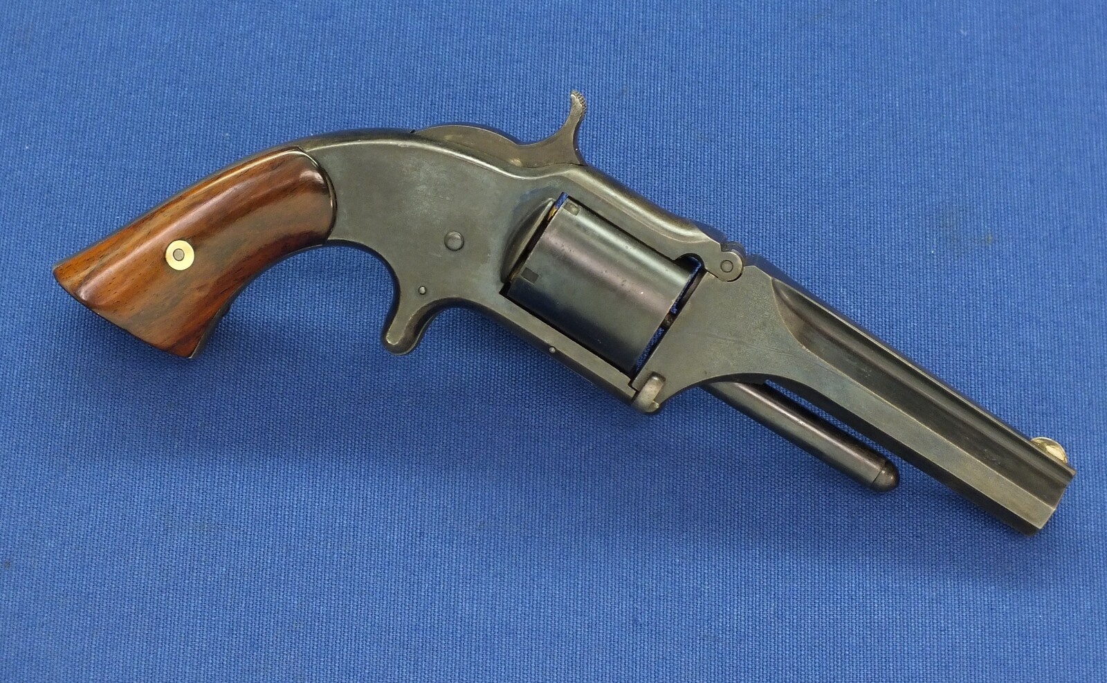 An antique 19th century American Smith & Wesson Revolver, Model No. 1-1/2 first Issue, .32 Rimfire caliber, 5 shot, 3 1/2 inch barrel, in very good condition.