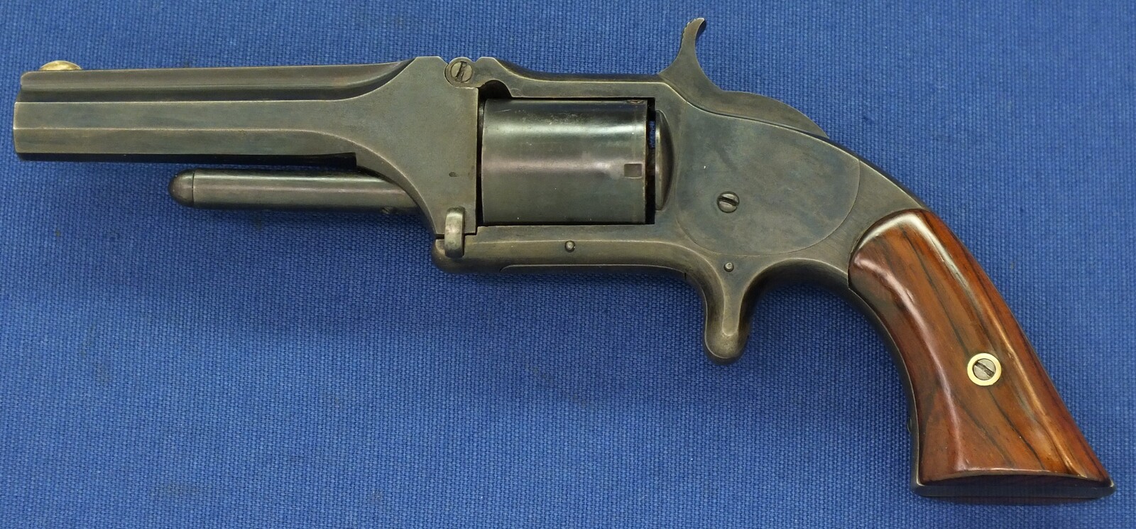 An antique 19th century American Smith & Wesson Revolver, Model No. 1-1/2 first Issue, .32 Rimfire caliber, 5 shot, 3 1/2 inch barrel, in very good condition.