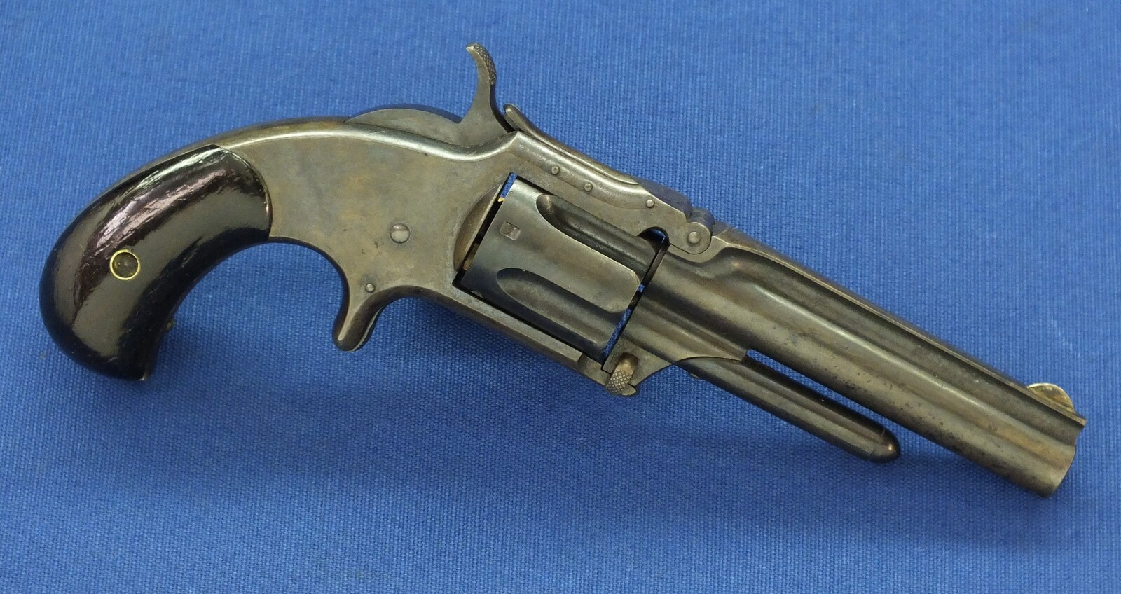 An antique 19th century American Smith & Wesson Revolver, Model No. 1-1/2 Second Issue, .32 Rimfire caliber, 5 shot, 3 1/2 inch barrel, in very good condition. 