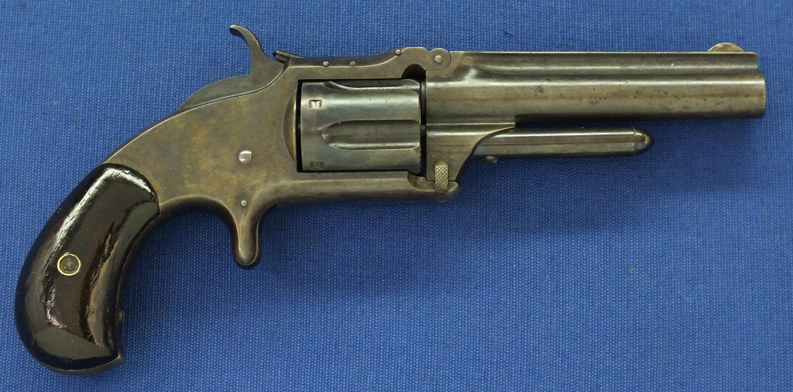 An antique 19th century American Smith & Wesson Revolver, Model No. 1-1/2 Second Issue, .32 Rimfire caliber, 5 shot, 3 1/2 inch barrel, in very good condition. 