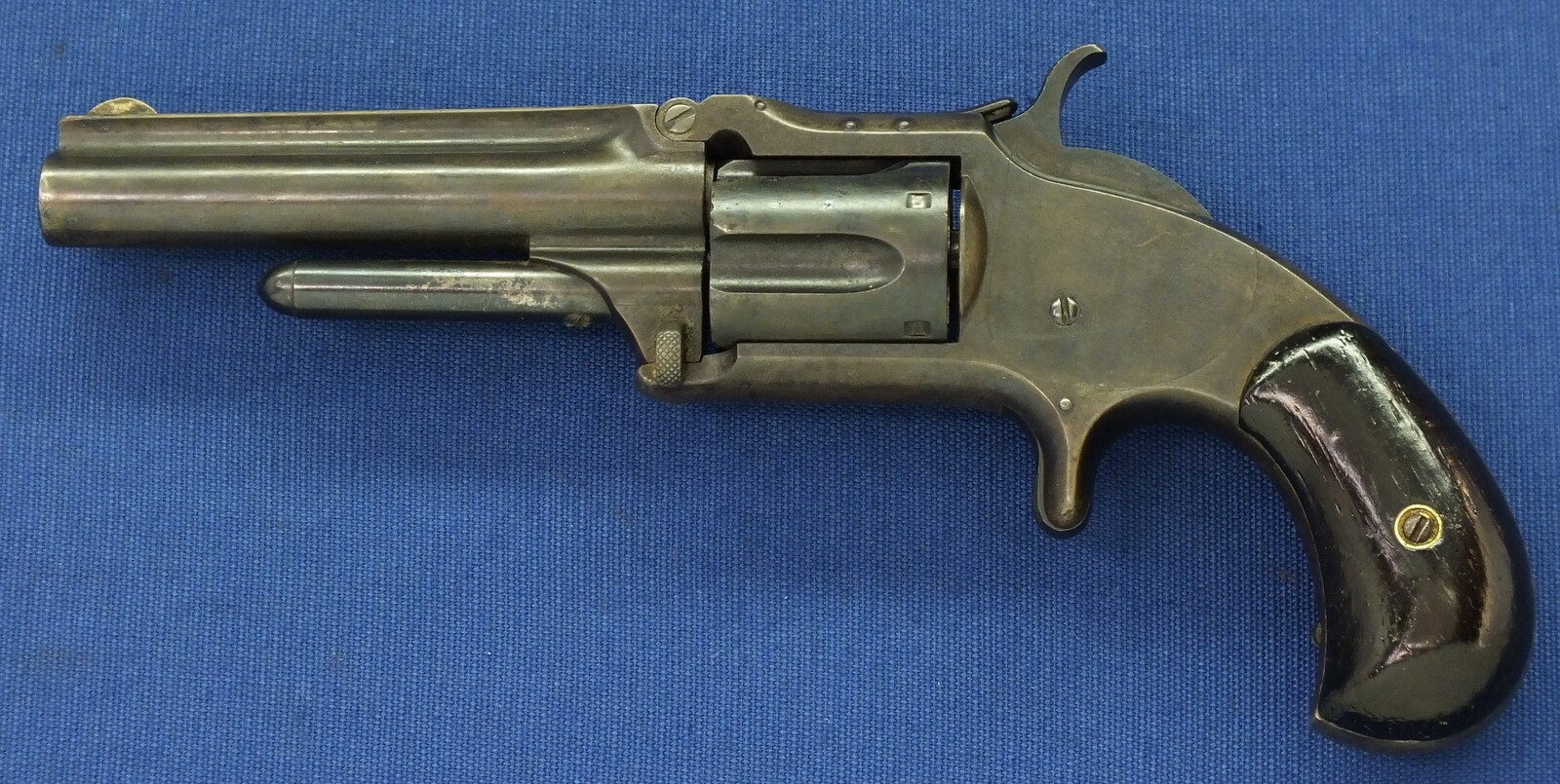 An antique 19th century American Smith & Wesson Revolver, Model No. 1-1/2 Second Issue, .32 Rimfire caliber, 5 shot, 3 1/2 inch barrel, in very good condition. 