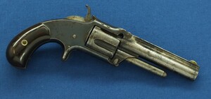 An antique  American Smith & Wesson Revolver, Model No. 1-1/2 Second Issue, .32 Rimfire caliber, 5 shot, 3 1/2 inch barrel, in good/very good condition. Price 750 euro