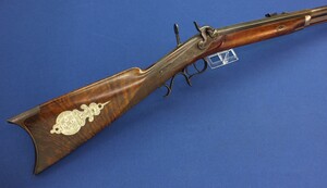 An antique American Target&Plains Percussion Rifle by Frank Wesson Worchester Mass. 40 Caliber, 28,5 inch part octagon-part round Heavy Barrel. Length 114cm. In very good condition. Price 1.950 euro.