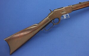 An antique American Winchester Model 1873 Rifle with 24 inch octagonal barrel with clear address. Caliber 38 W.C.F ( 38-40). Length 110cm. In very good condition. Price 3.650 euro