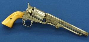 An antique Belgian Brevete engraved and Nickel Plated Colt Model 1851 Navy 6 shot Percussion Revolver by Jean-Baptiste Rongé & Fils. Caliber 35, 7 inch barrel. Length 34,5cm. In very good condition. Price 1.750 euro.
