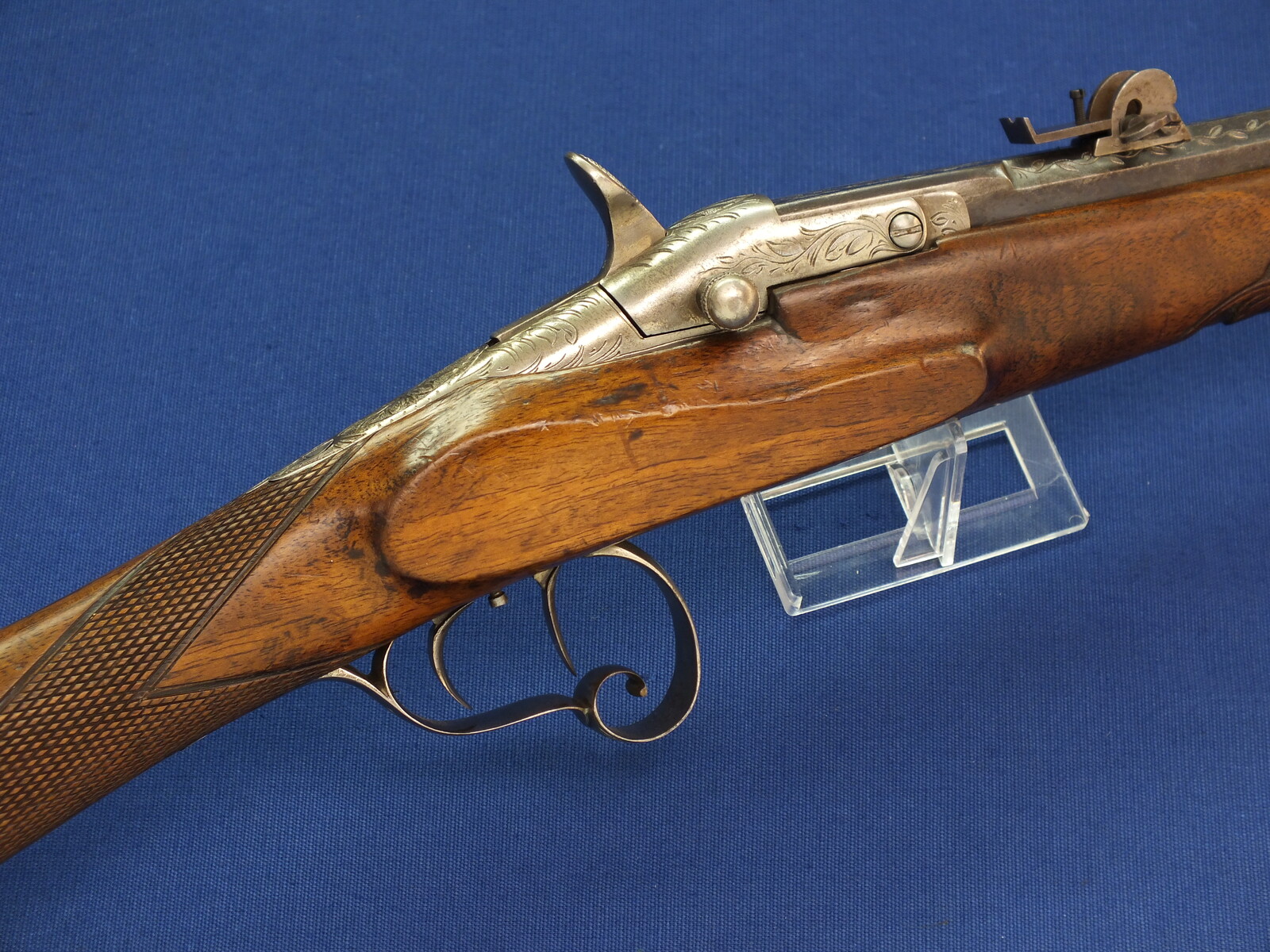 An antique Belgian engraved Flobert Rifle. Caliber 6mm rimfire. Length 103cm. In very good condition. Price 595 euro.