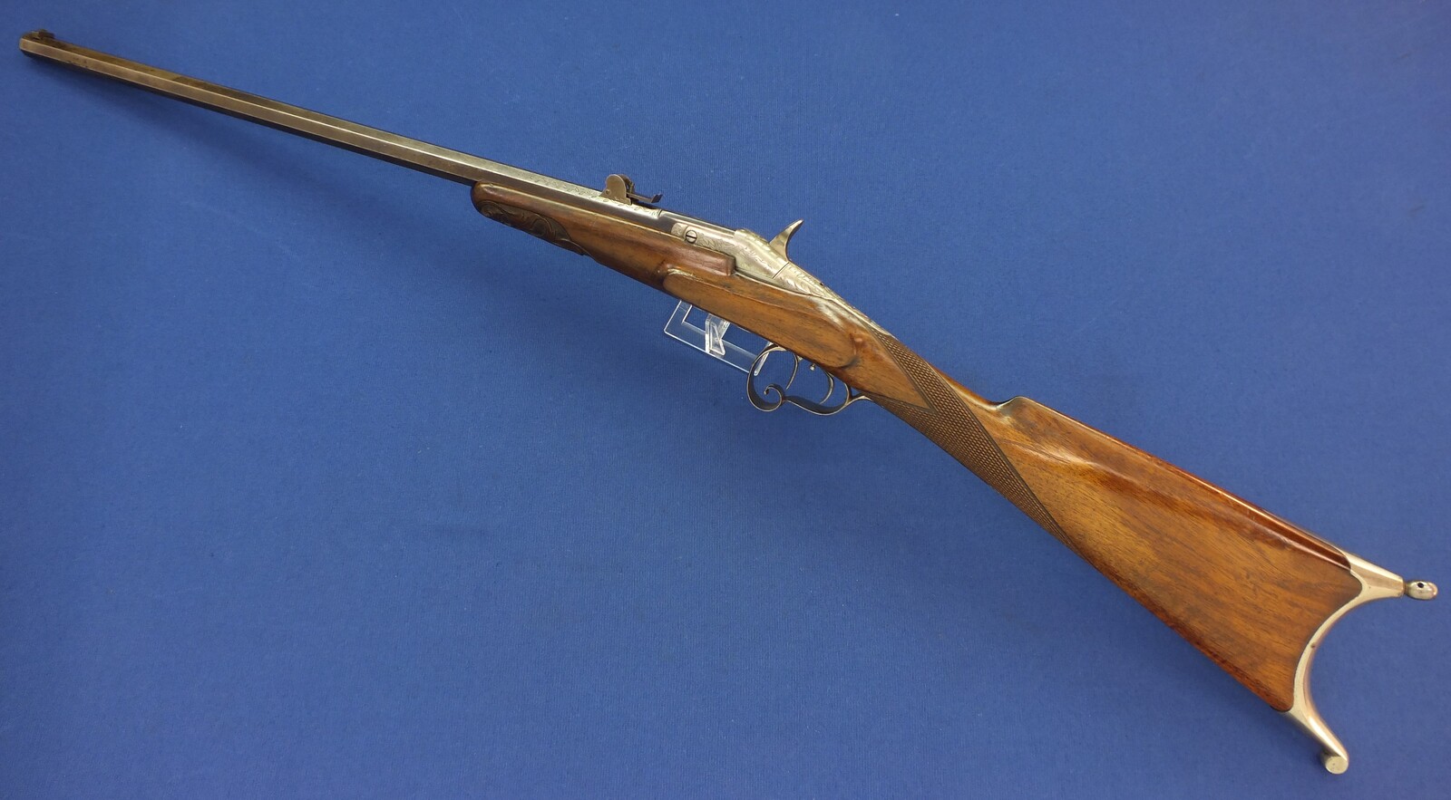 An antique Belgian engraved Flobert Rifle. Caliber 6mm rimfire. Length 103cm. In very good condition. Price 595 euro.