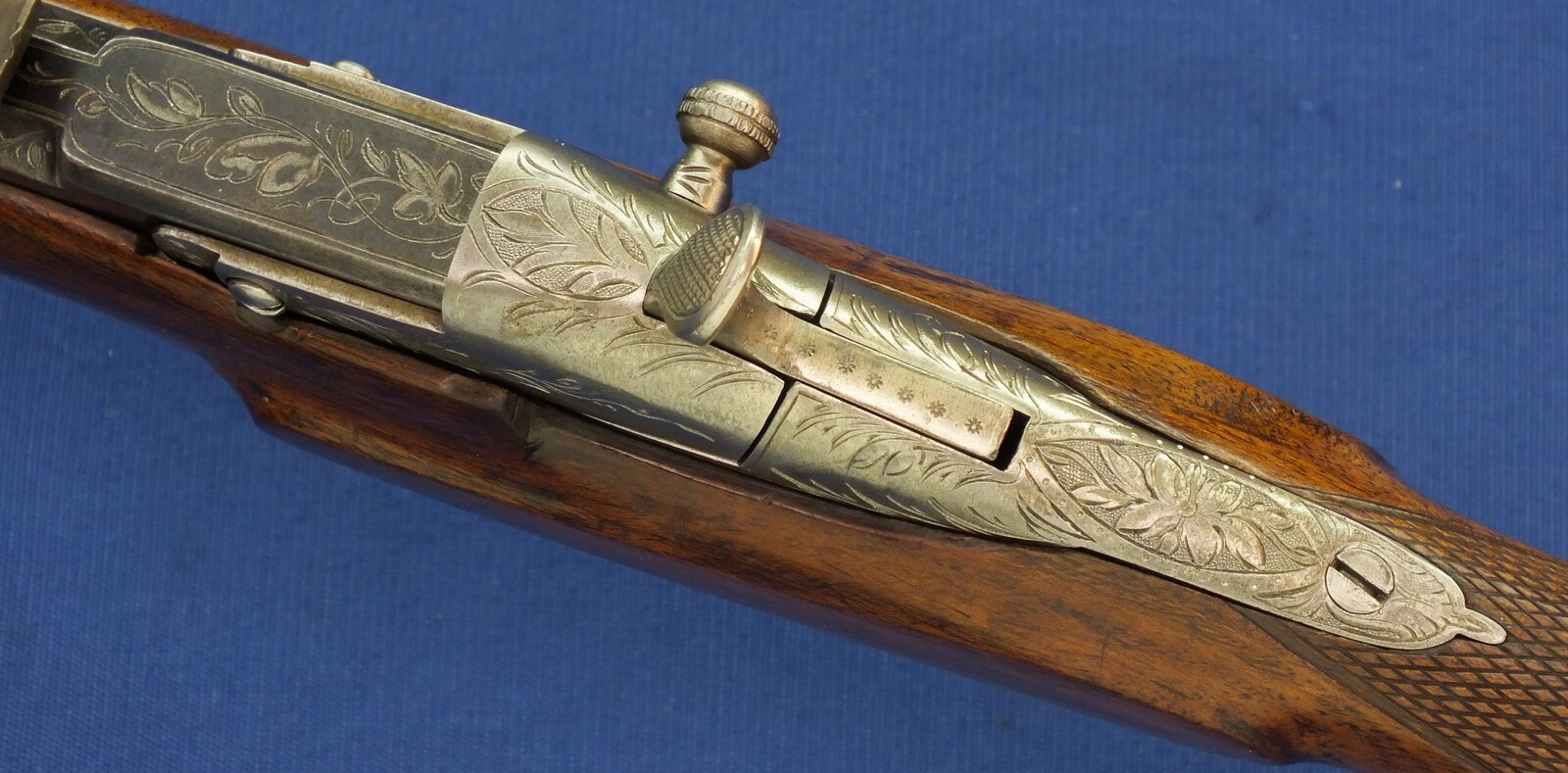 An antique Belgian engraved Flobert Rifle. Caliber 6mm rimfire. Length 103cm. In very good condition. Price 595 euro.