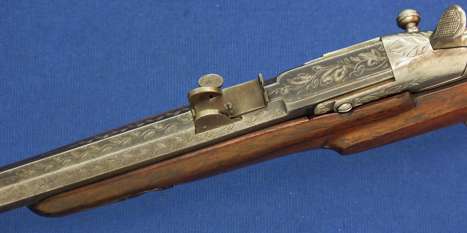 An antique Belgian engraved Flobert Rifle. Caliber 6mm rimfire. Length 103cm. In very good condition. Price 595 euro.