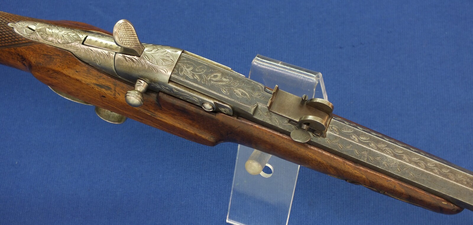 An antique Belgian engraved Flobert Rifle. Caliber 6mm rimfire. Length 103cm. In very good condition. Price 595 euro.