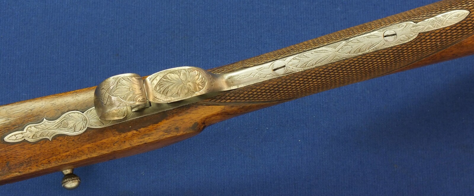 An antique Belgian engraved Flobert Rifle. Caliber 6mm rimfire. Length 103cm. In very good condition. Price 595 euro.