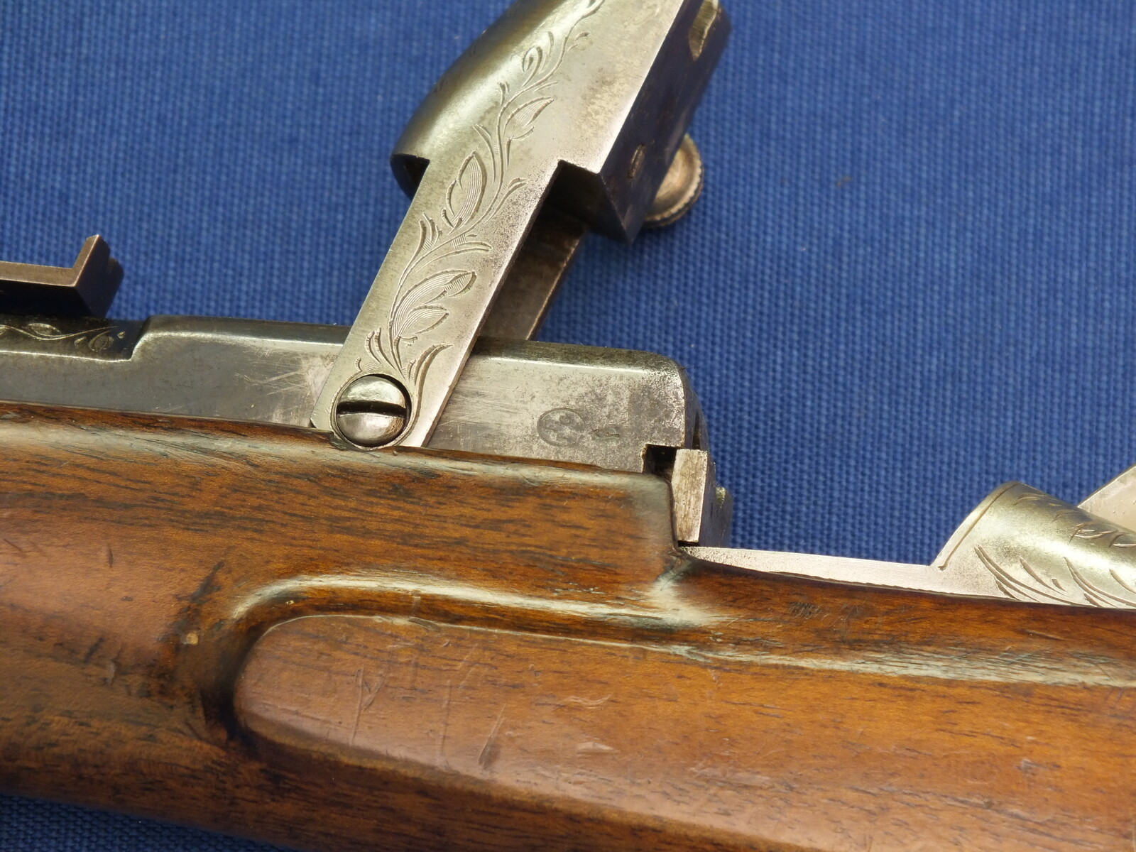 An antique Belgian engraved Flobert Rifle. Caliber 6mm rimfire. Length 103cm. In very good condition. Price 595 euro.