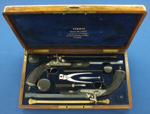 An antique cased French pair of Percussion pistols by Firmin Paris, successor of Alphonse Caron circa 1860. 12mm Caliber, length 43cm. In very good condition. Price on request.
