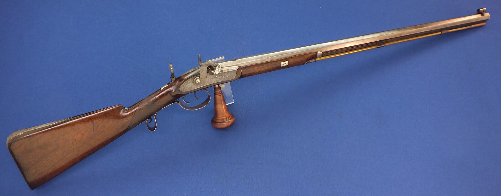 An antique English Target Percussion rifle with set-triggers. Lock Signed: Colling (William, Hexham, Northumb) Circa 1850. 30 inch octagon barrel. Caliber 10mm. Length 120cm. In very good condition. Price 750 euro