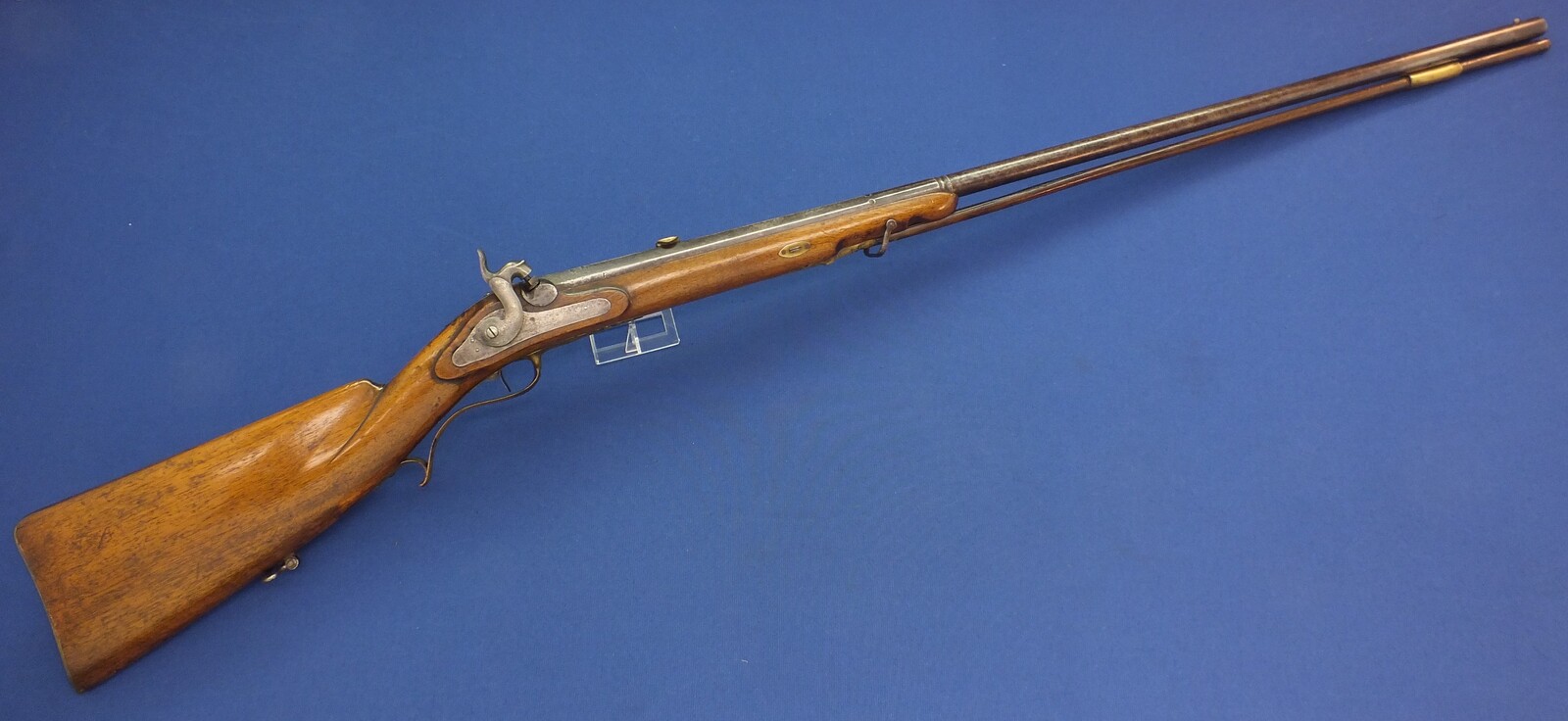 An antique German/Swiss Percussion Sporting gun circa 1850. Caliber 15.5mm. Length 140cm. In very good condition. Price 595 euro.