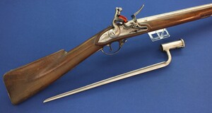 An antique late 17th century German Saxony / Swiss Flintlock Musket with bayonet. Lock with Suhl mark. 105,5cm Barrel marked F658. Caliber 18mm. Length 143cm. In very good condition. Price 1.750 euro.