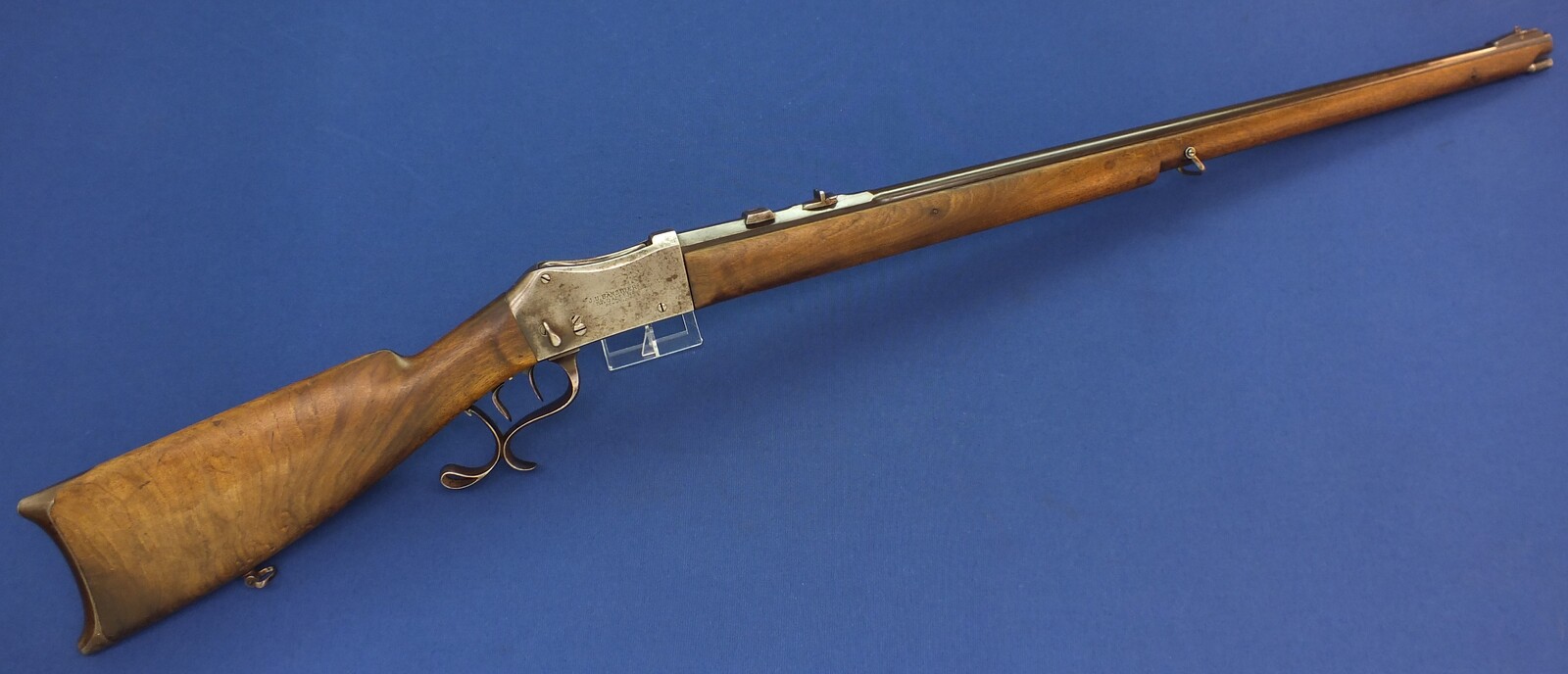 An antique Swiss Martini-Henry breechloading Rifle by J.U. Banziger St. Gallen. Caliber 41 Swiss Rim and Centerfire. 75,5cm barrel. Set-triggers. Length 119cm. In very good condition.