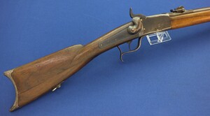 An antique Swiss Peabody Model 1867-77 Rifle altered for Hunting signed E.P. Vassella. Caliber 41 Swiss Rimfire. Length 132cm. In very good condition. 