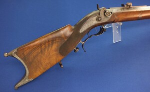 An antique Swiss percussion Stutzer/sharpshooters Rifle by Johann Müller in Bern (1800-66). 96cm octagonal Damast barrel. Fine etched steel mounts. Caliber 17mm. Length 135cm. In very good condition. Price 1.750 euro.