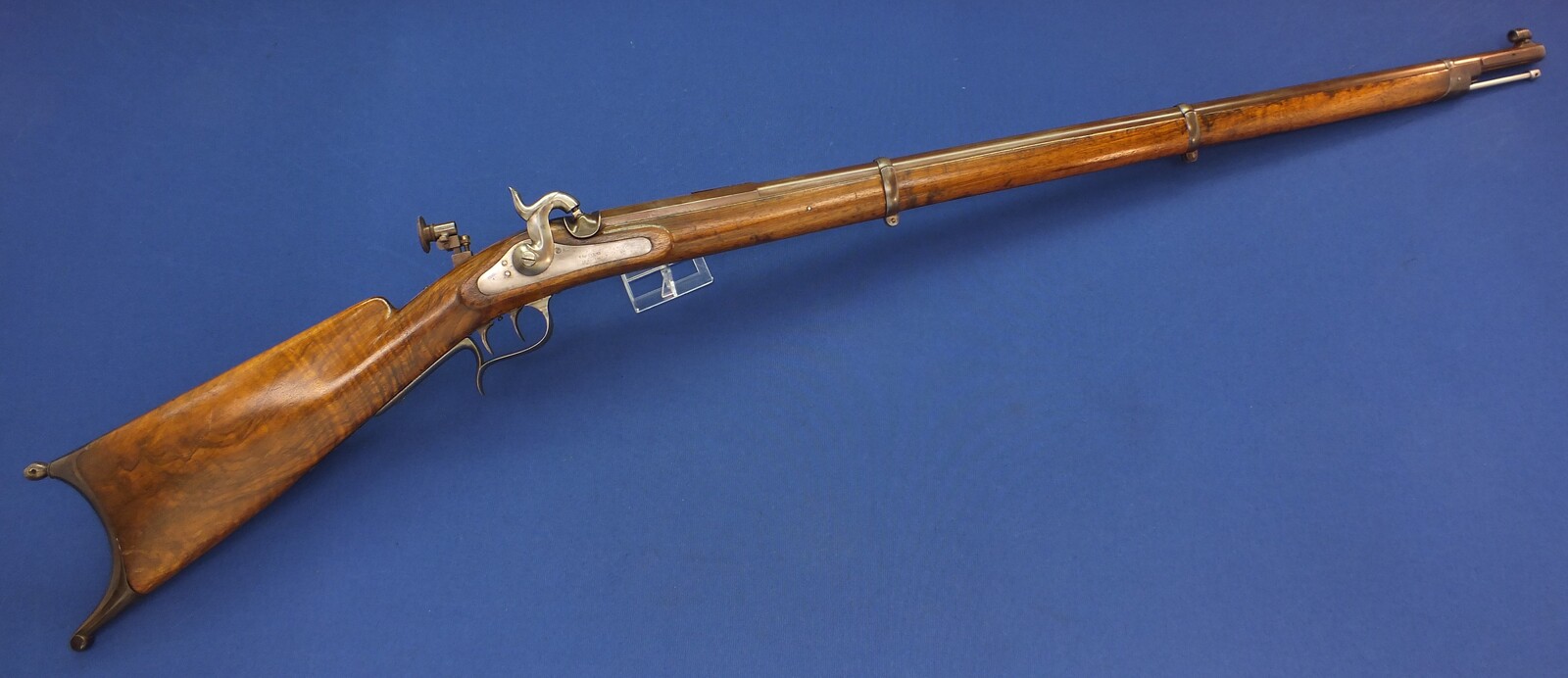 An antique Swiss Stutzer/target percussion Rifle by V. Sauerbrey in Basel. Set-triggers. Caliber 11mm. Length 136cm. In very good condition. Price 1.350 euro