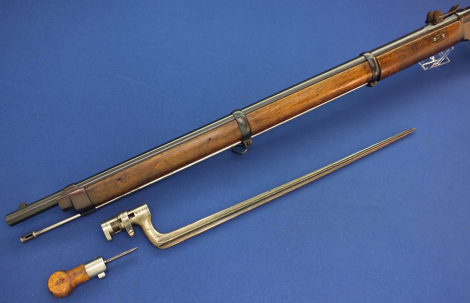 An antique Swiss Vetterli Model 1869-71 Infantery Rifle with Bayonet and screw Driver. Caliber 10,4 Rimfire. Length 130cm. In very good condition. Price 995 euro