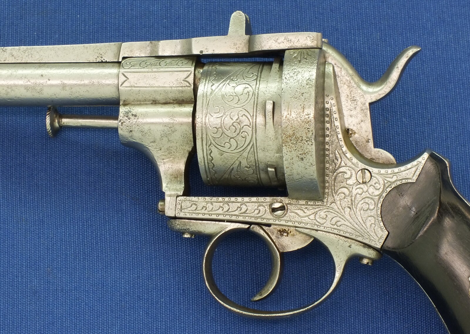 An antique unrestored French 12mm engraved Pinfire Revolver. 6 shot double action. Ebony grips. Length 29,5cm. In fair/good condition. 