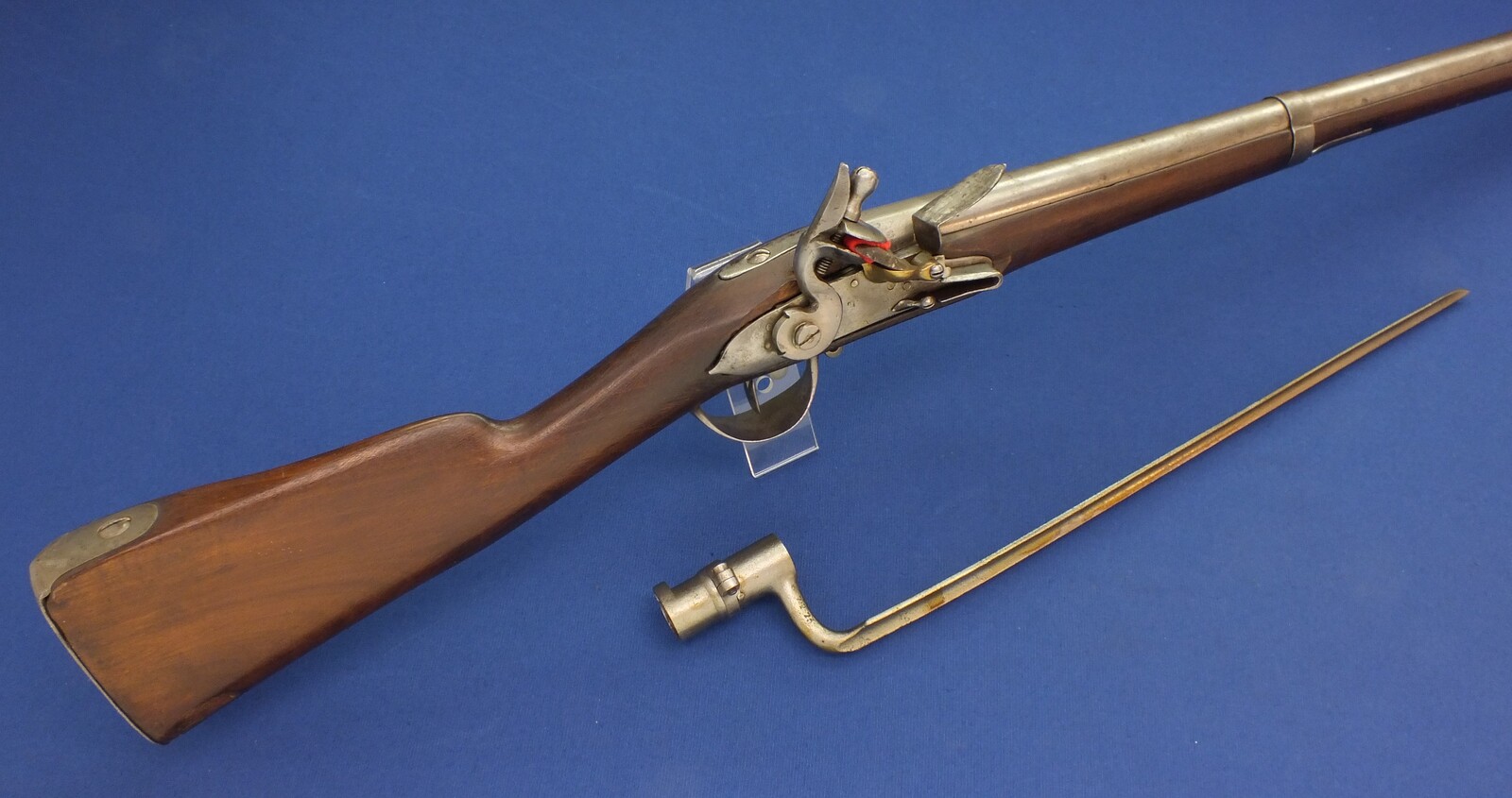 An antique  unrestored French Revolution Period Flintlock Musket Model 1777, caliber 18 mm, length 140 cm, complete with bayonet, in good condition. Price 750 euro