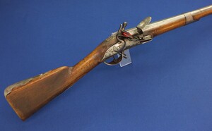 An unrestored antique Swiss Flintlock Musket, on the barrel the Bern marking, circa 1800, caliber 18 mm, length 138 cm, in good condition